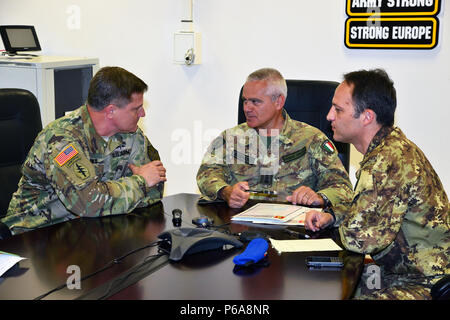 Colonel Steven M. Marks, commander United States Army Garrison Italy (left), Italian Army Colonel Federico Pognant Airassa, Public Information Officer Command, Land forces operational Commander “COMFOTER” (center), and Colonel Umberto D`Andria, Italian Base Commander Caserma Ederle (right), during the meeting media strategies in Caserma Ederle, Vicenza, Italy, May 31, 2016. Italian Army visit U.S. Army, in order to enhance to bilateral relations and to expand levels of cooperation and the capacity of the personnel involved in joint operations. (Photo by Visual Information Specialist Paolo Bovo